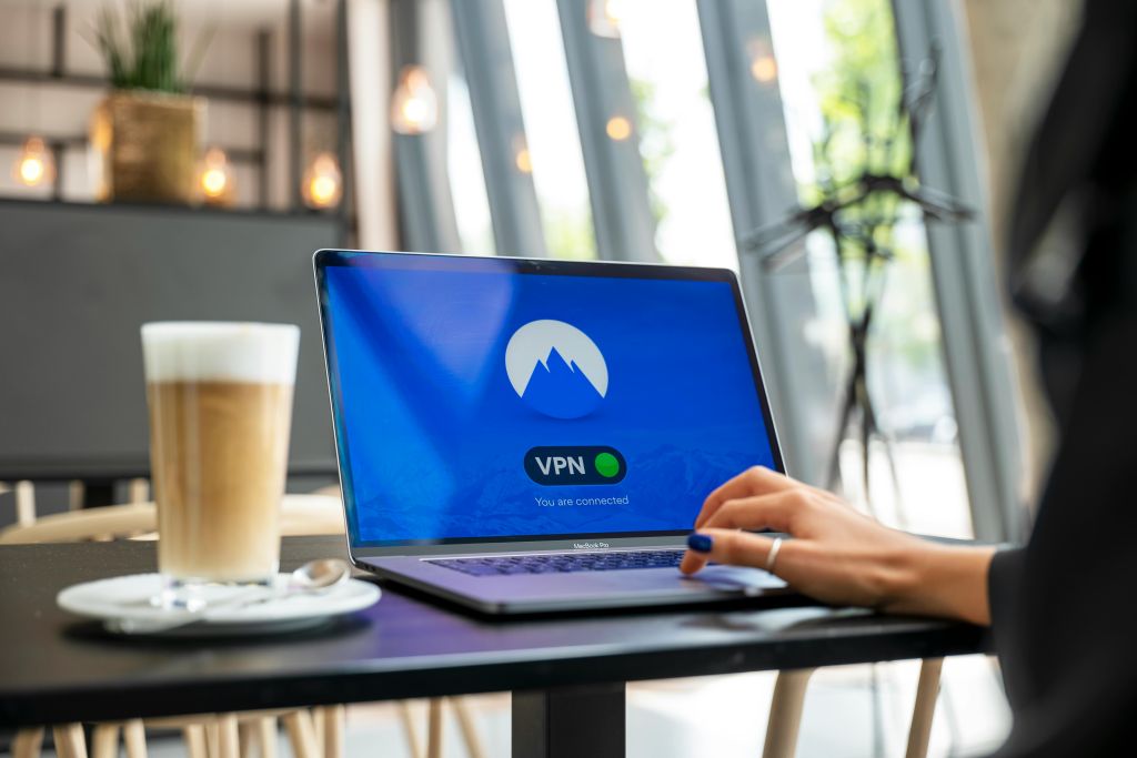 Photo of a girl using VPN on her laptop